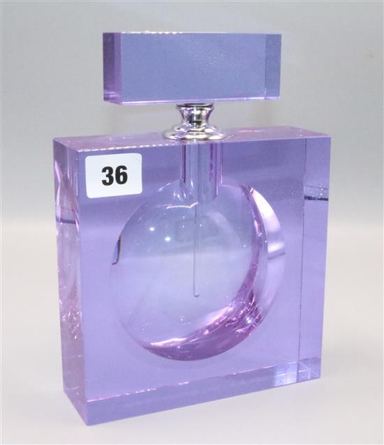 An amethyst glass scent bottle